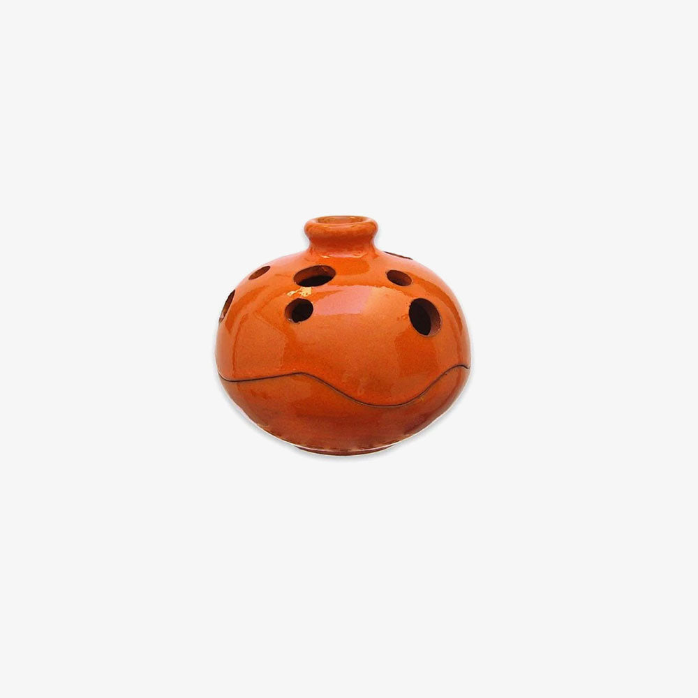 Embellisseur en forme de boule orange